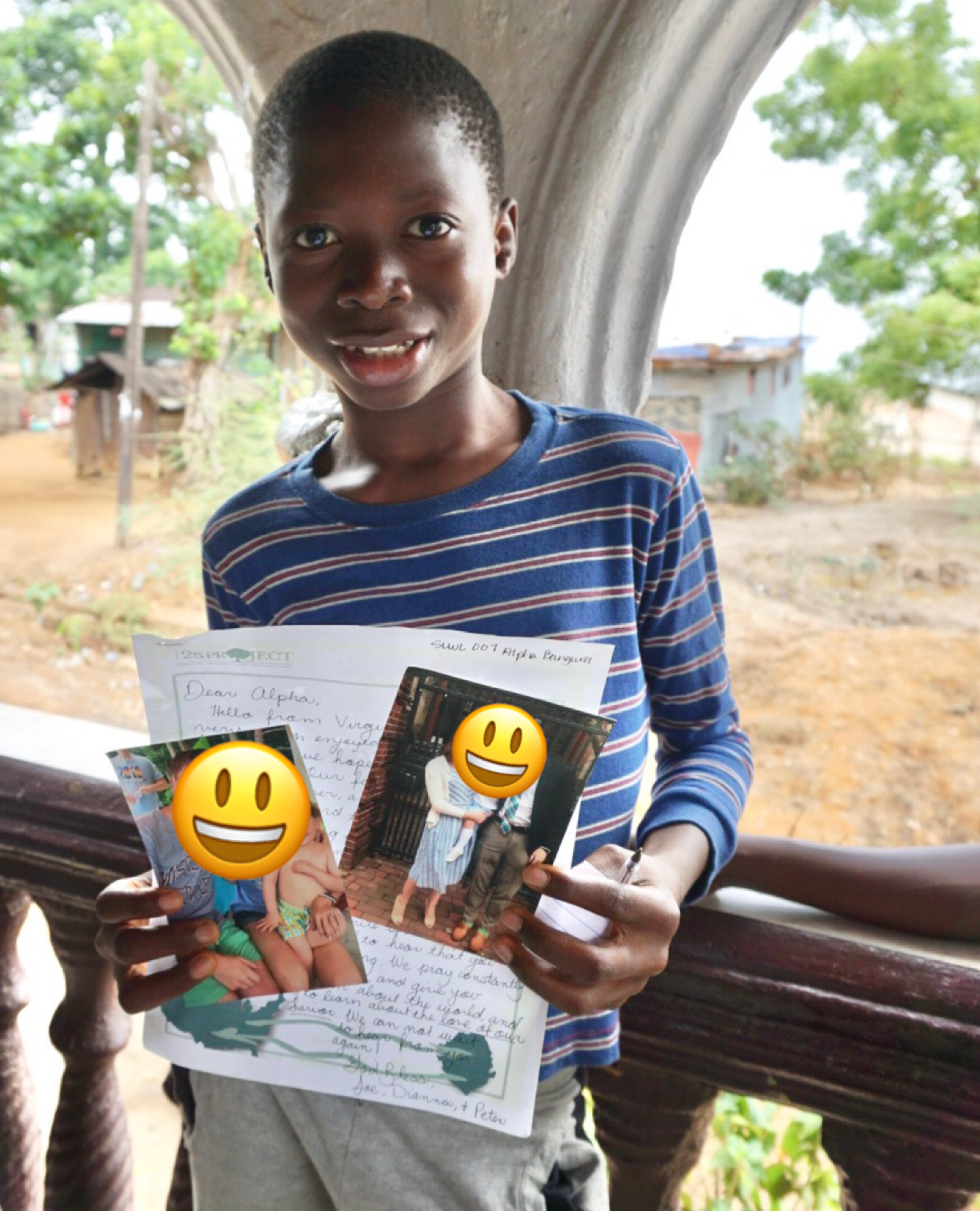 Alpha in Sierra Leone excited about the letter and pictures his sponsors sent.