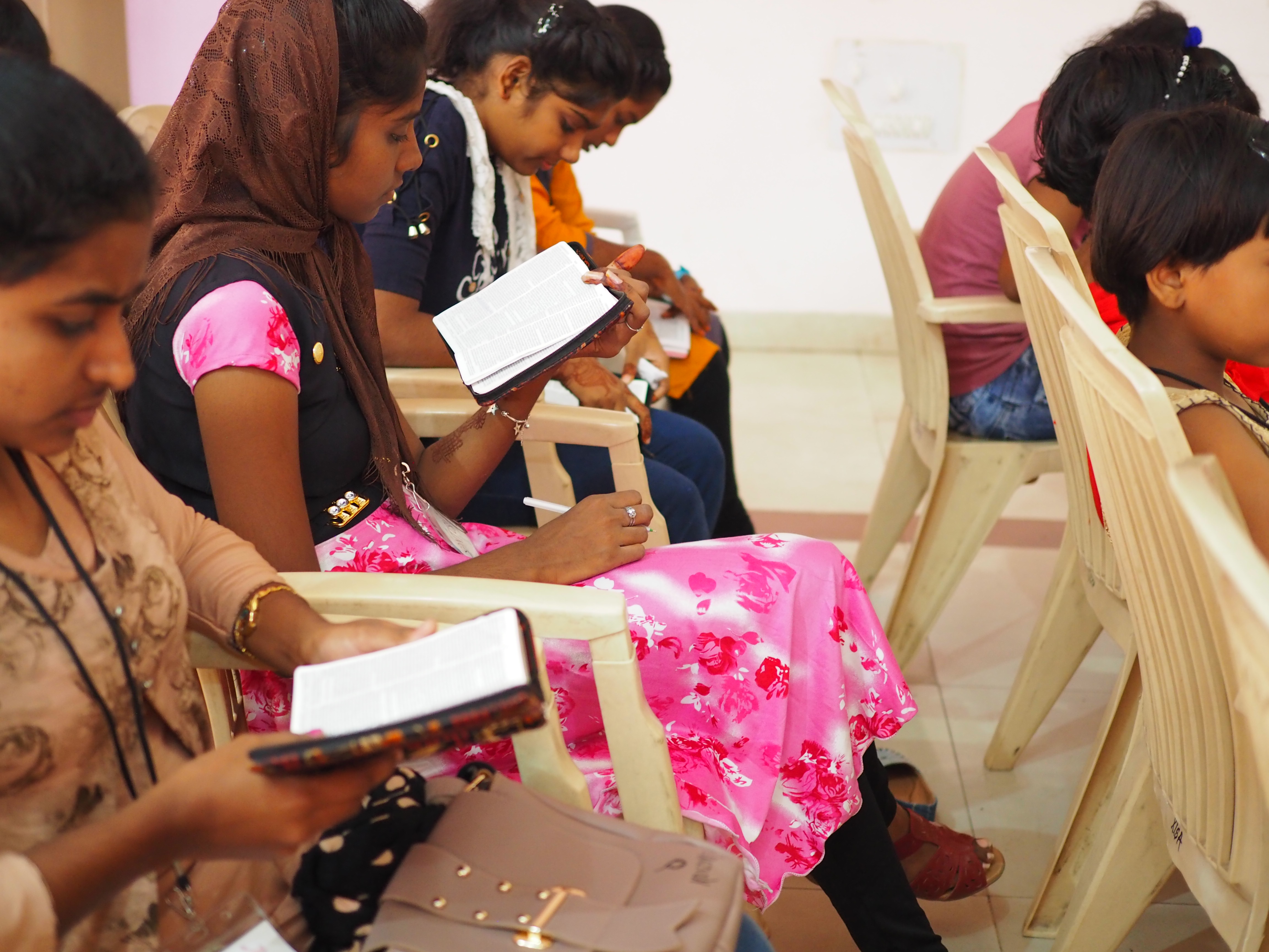 Our youth and children in South Asia studying God's Word.